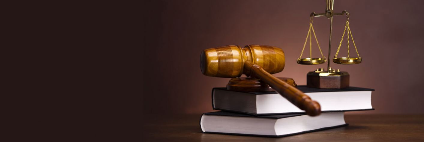 Gavel, law books and scales of justice